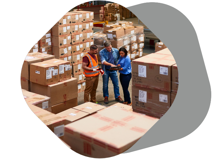 Warehouse workers with retail fulfillment packages