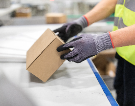 Warehouse worker handling a package